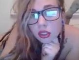 Naughty Chick with glasses masturbating and loving it