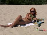 Skinny young nudist babes enjoy a sunny day at the beac