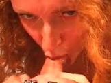 Redhead with nice tits sucks cock for cum