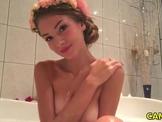 Petite Chick masturbating in the bathtub