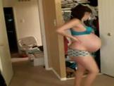 Woman Showing Off Prior To Start of Labor