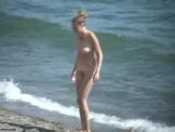 Busty Blonde walking nude on Beach