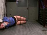 Hogtied in a van