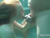 Redhead hottie eats cock underwater for cash
