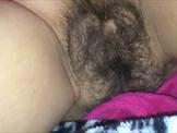 Spraying her hairy vagina with cum