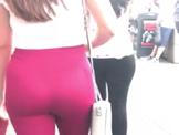 Voyeur Ass in red pants and long brown hair