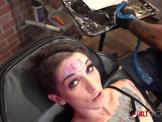Sully Savage gets a new UV tattoo on her forehead