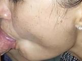 a Asian MILF Sucking Cock in tolet on video